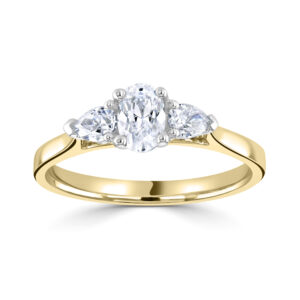Three stone Oval centre Diamond with two Pear Cut Diamonds either side